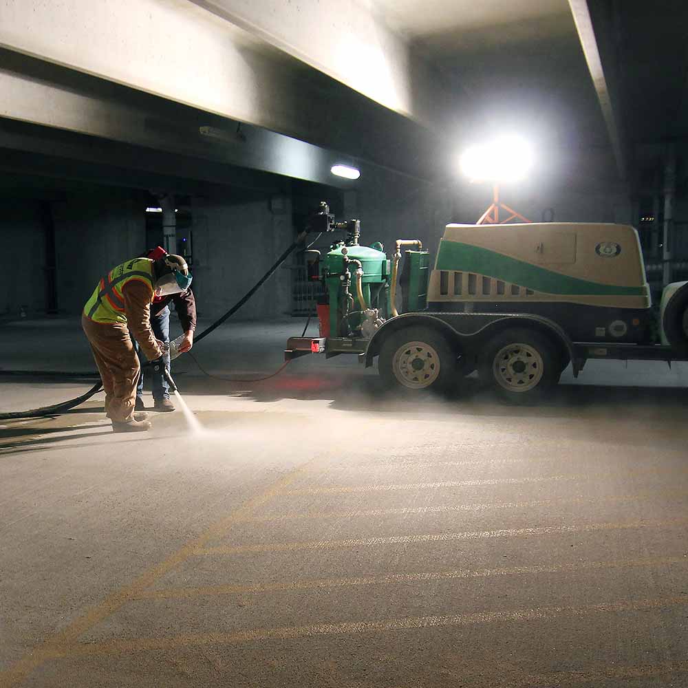 parking garage concrete line stripe paint removal downtown charleston